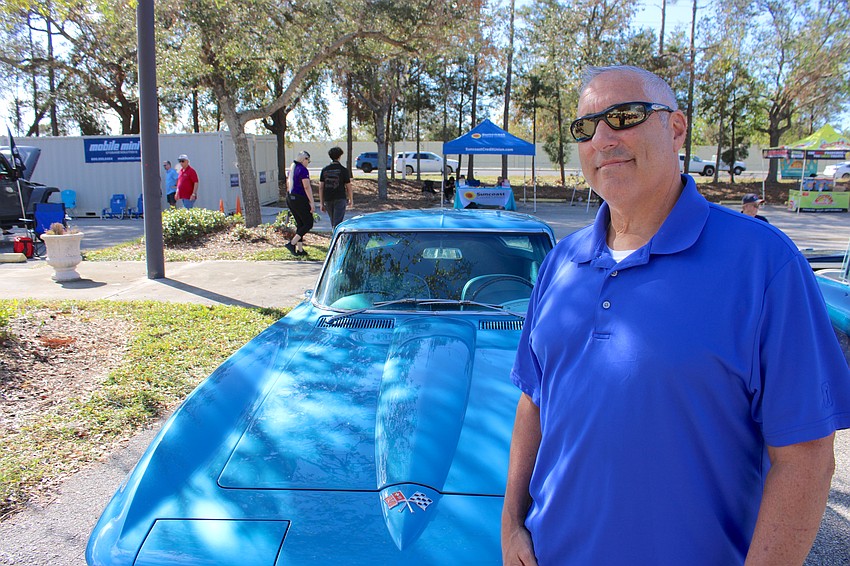 Lakewood Ranch's Chris Carnevale stands in front of his 1965 
Corvette Sting Ray he was showing at the Knights Car Show.