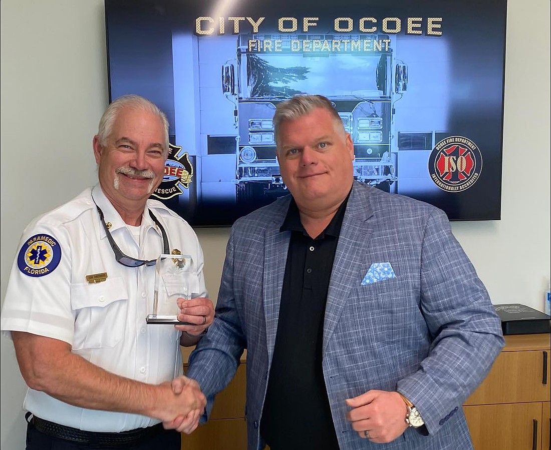 Ocoee Fire Chief Tom Smothers, left, with Ocoee City Manager Craig Shadrix.