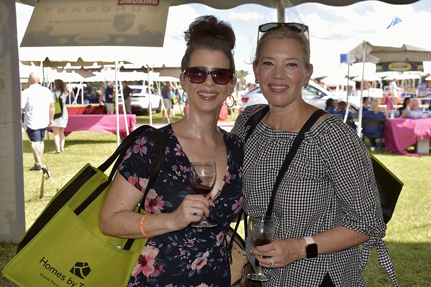 Sarasota's Heather Deyrieux and Lauren Ursone sip on a Spanish red wine.