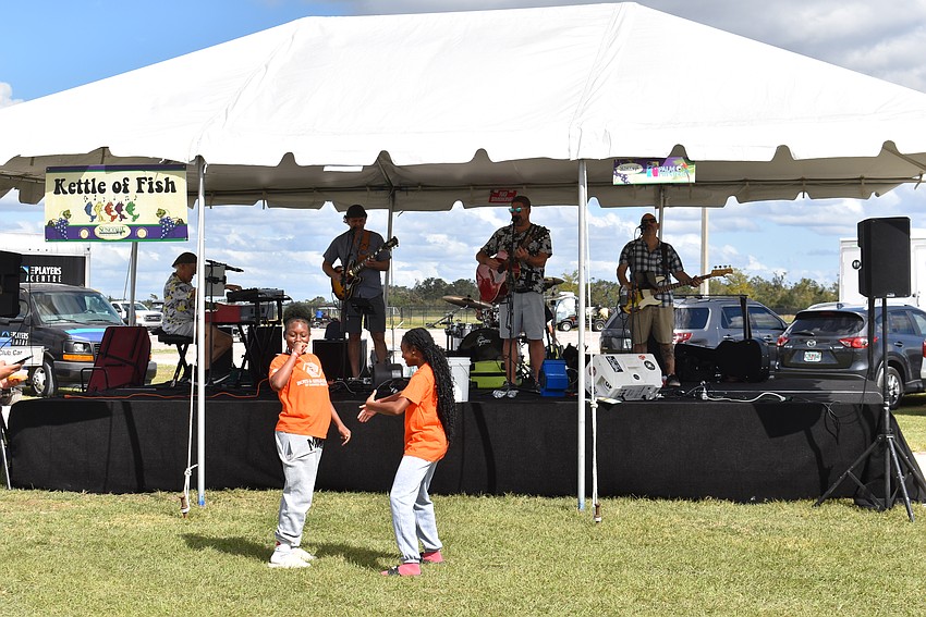 Kettle of Fish entertains the guests at the Suncoast Food & Wine Fest on Nov. 2.