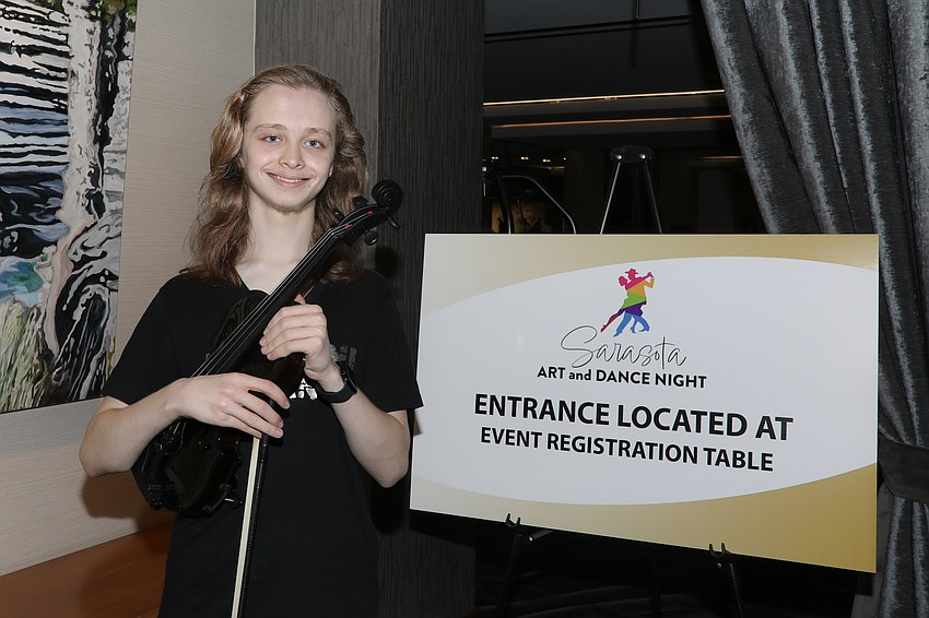 15-year-old Serafim Fitzgerald is ready to play the violin and dance.