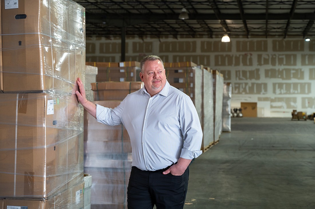 Harmar CEO Steve Dawson stands in the warehouse on Independence Boulevard in north Sarasota.