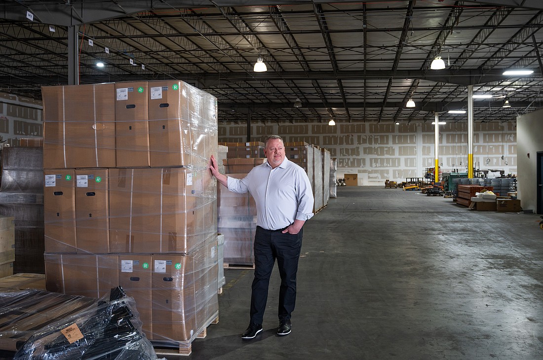 Harmar CEO Steve Dawson stands in the warehouse on Independence Boulevard in north Sarasota.