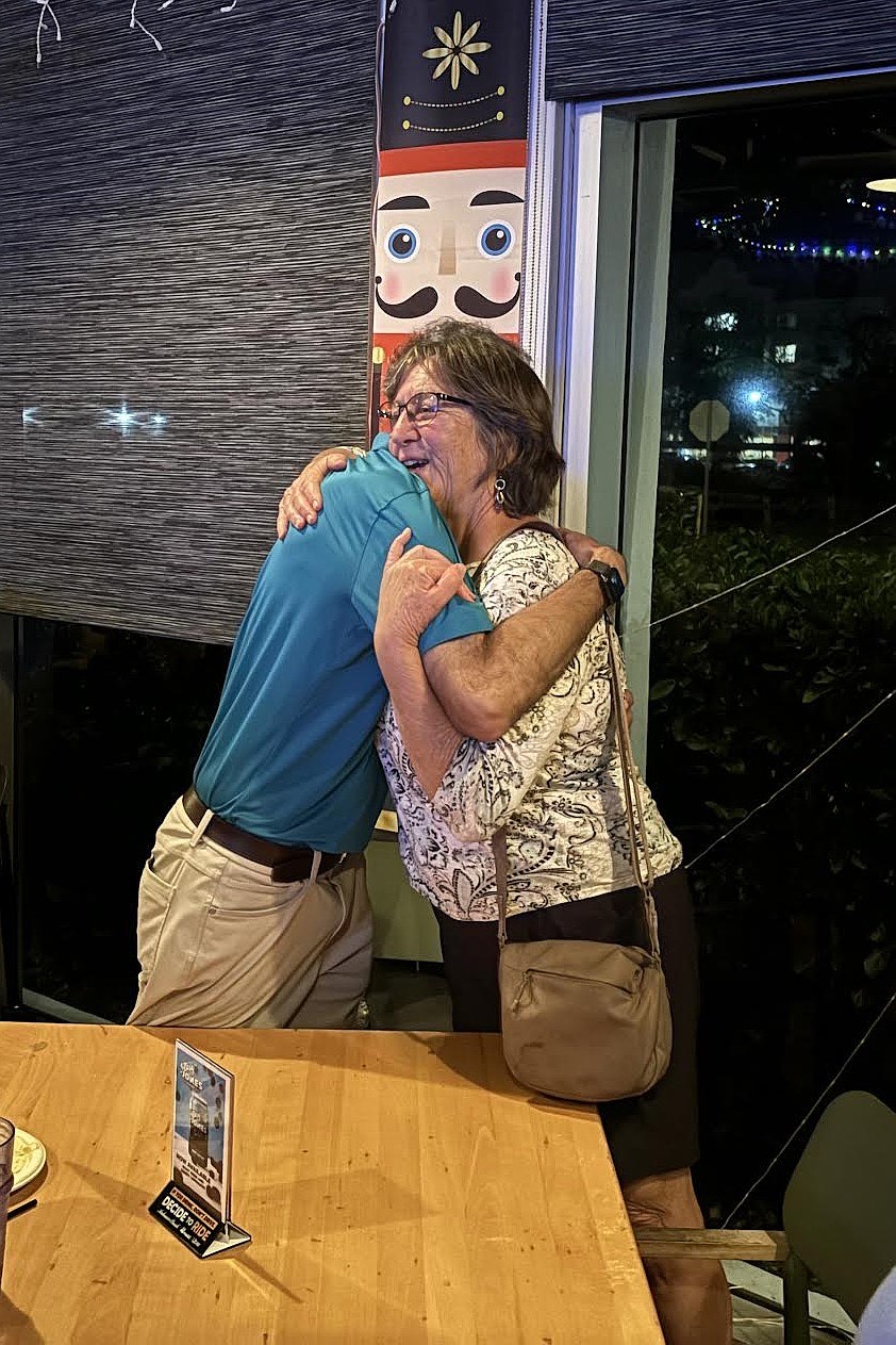 Ron Kashden greets Lorrie Muldowney.