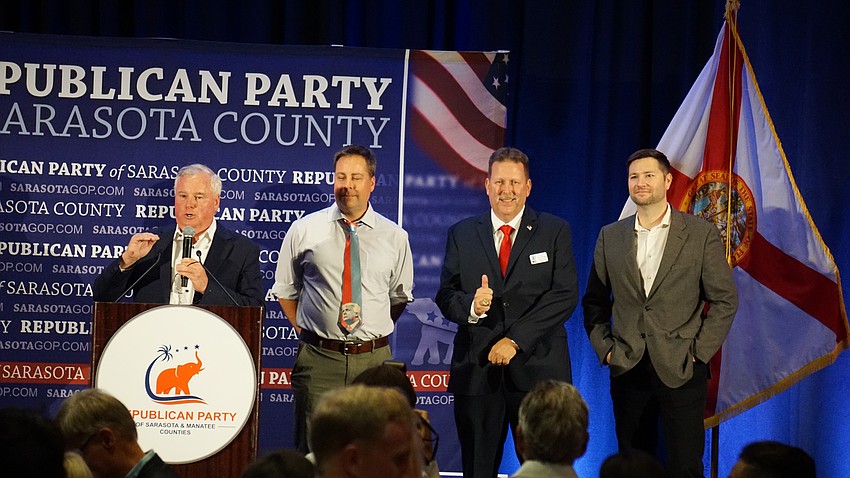 Chairman of the Republican Party of Sarasota County Jack Brill introduced three Republican winners of Sarasota's Charter Review Board. From left to right: District 4 Greg 
