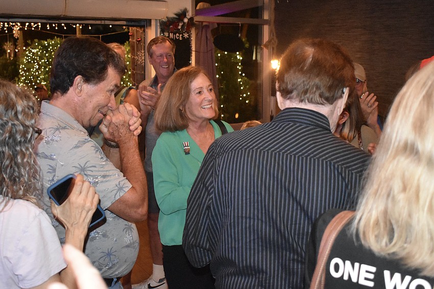 Kathy Kelley Ohlrich is congratulated on her victory.
