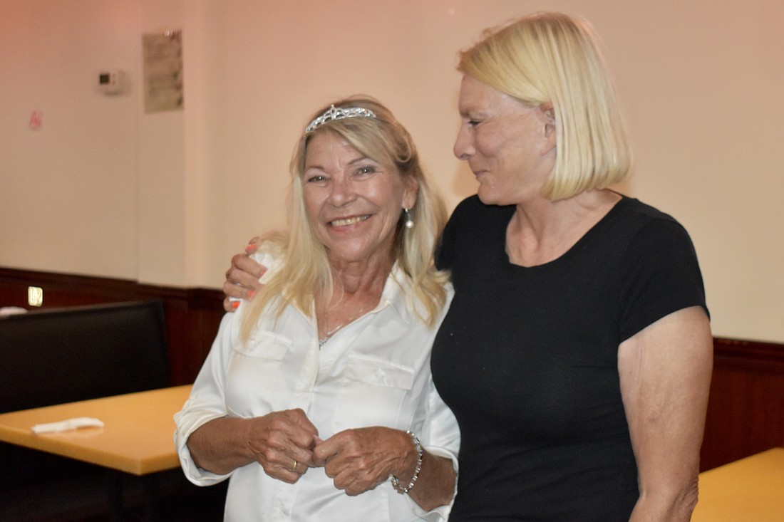 Carol Felts wins the District 1 race and is congratulated by friend and campaign volunteer Marnie Matarese.