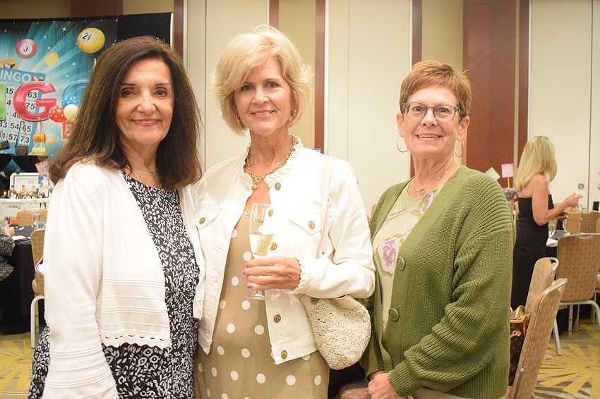 Venice's Marilyn Hodory, Sarasota's Gail Hargaden and Venice's Maureen Villarreal attend their first Designer Bag Bingo.