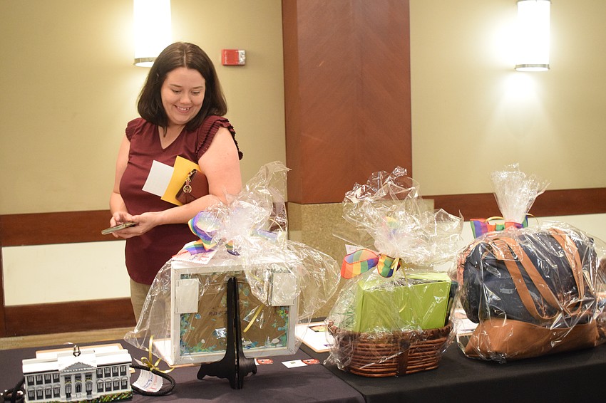 Myakka City's Meagan Jones peruses the baskets available in the silent auction. 