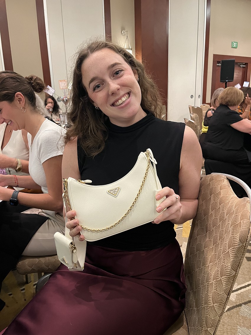 Sarasota's Jena Robustelli wins a Prada Saffiano. 