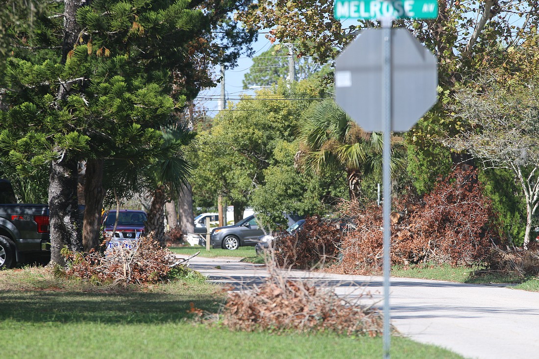 Debris awaits to be collected on Andrews Street in Ormond Beach. Photo by Jarleene Almenas