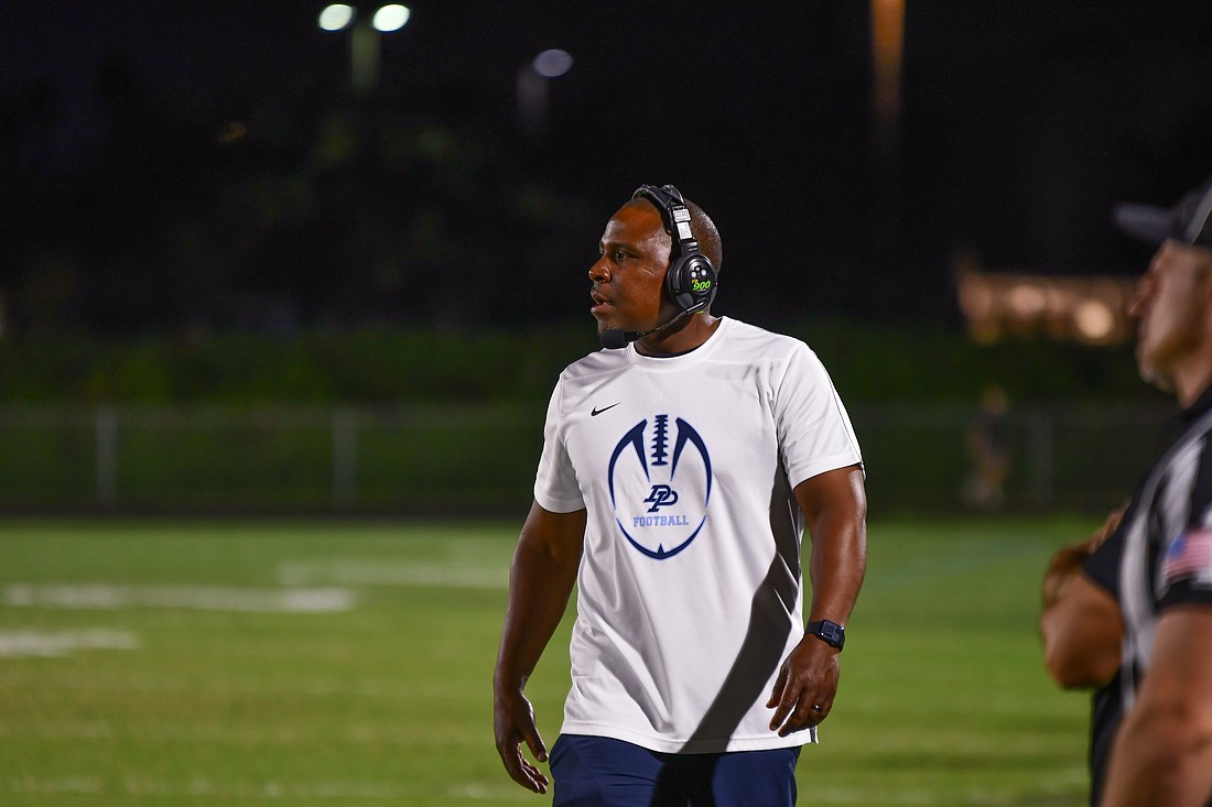Dr. Phillips football coach Rodney Wells roamed the sidelines.