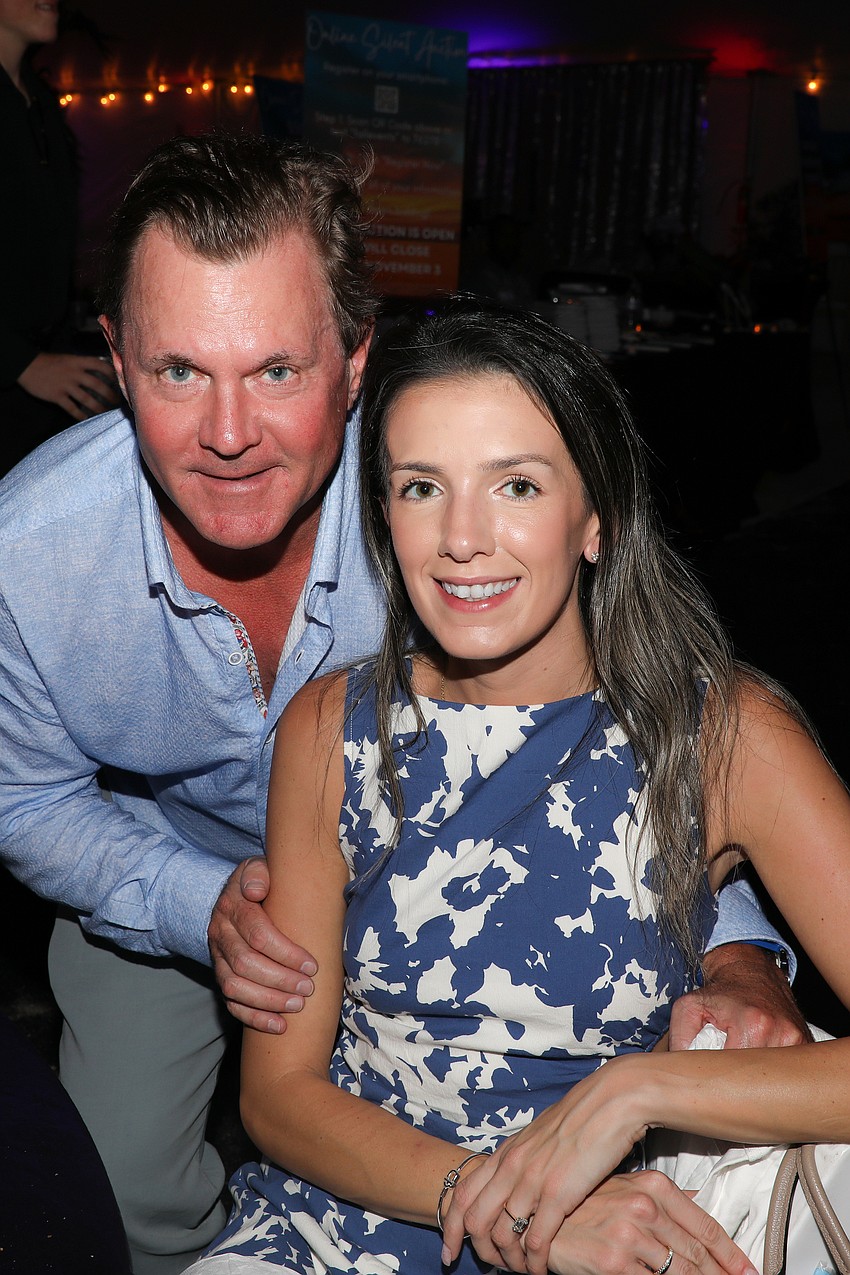 Todd Keebaugh and Haley Geoffroy planned a clothing color palate most suitable for a beach party.