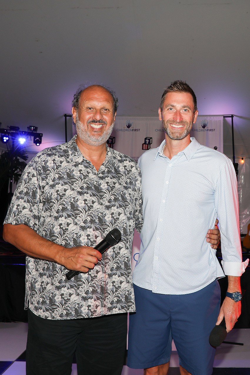 With help from Keith Johnson it's no surprise that CEO Philip Tavill was able to auction off several 'first-in-line' table spots for $1,000 each.