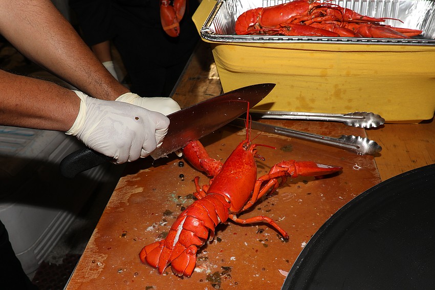 Chefs prepare fresh lobster for Children First's Rockin' Lobster event.