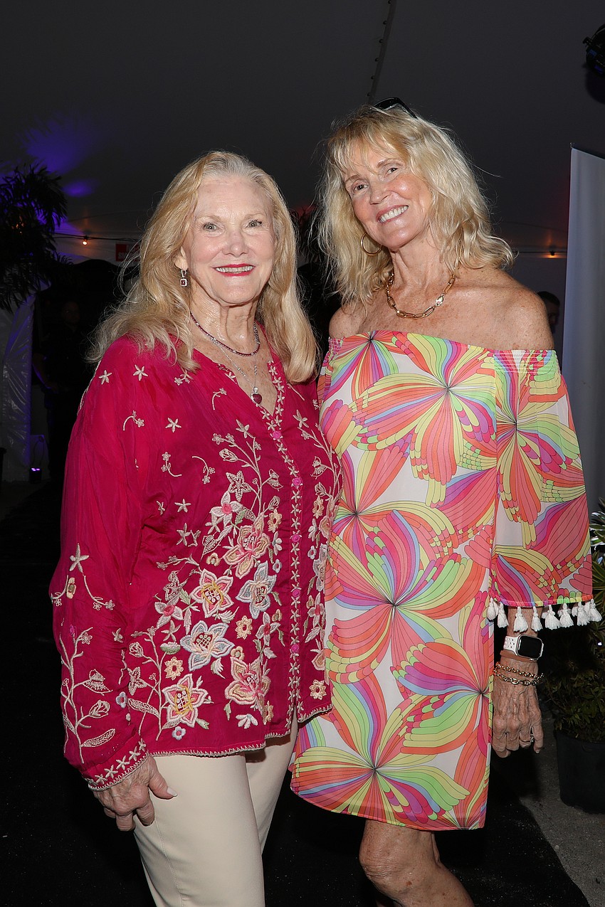 Peggy Popham and Jan Shoemaker Means are enjoy a breezy evening.