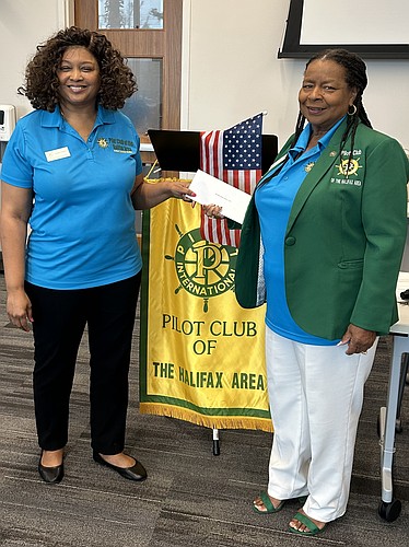 Elissa Thomas, president-elect of Pilot Club of the Halifax Area, presents the check to Janet Bryant, executive director of the Rose Marie Byron Children's Center. Courtesy photo