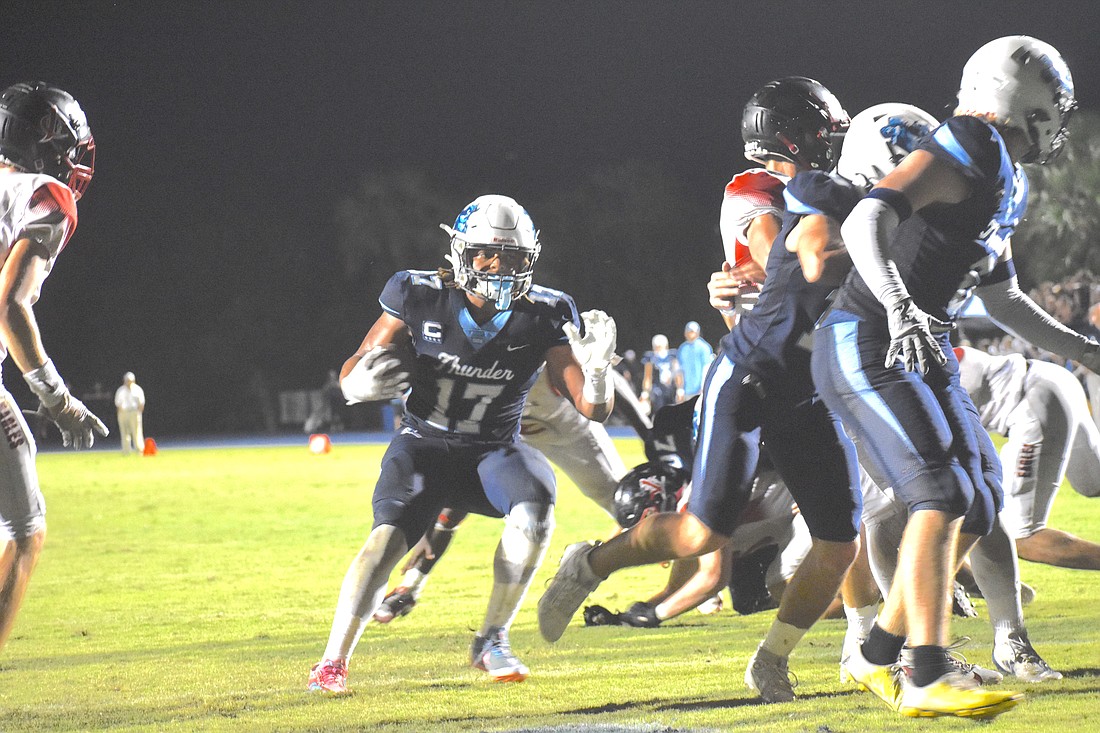 ODA's Allen Clark powers to one of his four touchdown runs in the 29-26 loss to Jupiter Christian in the SSAC 5A semifinal Friday in Lakewood Ranch.