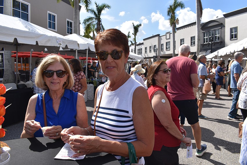 Del Webb residents Kathy Garabedian and Marisa Radley say the New England clam chowder from Metz is delicious.
