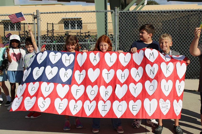 Christina Mulligan's third grade students showed a lot of heart during the Veterans Day parade at Gilbert McNeal Elementary.