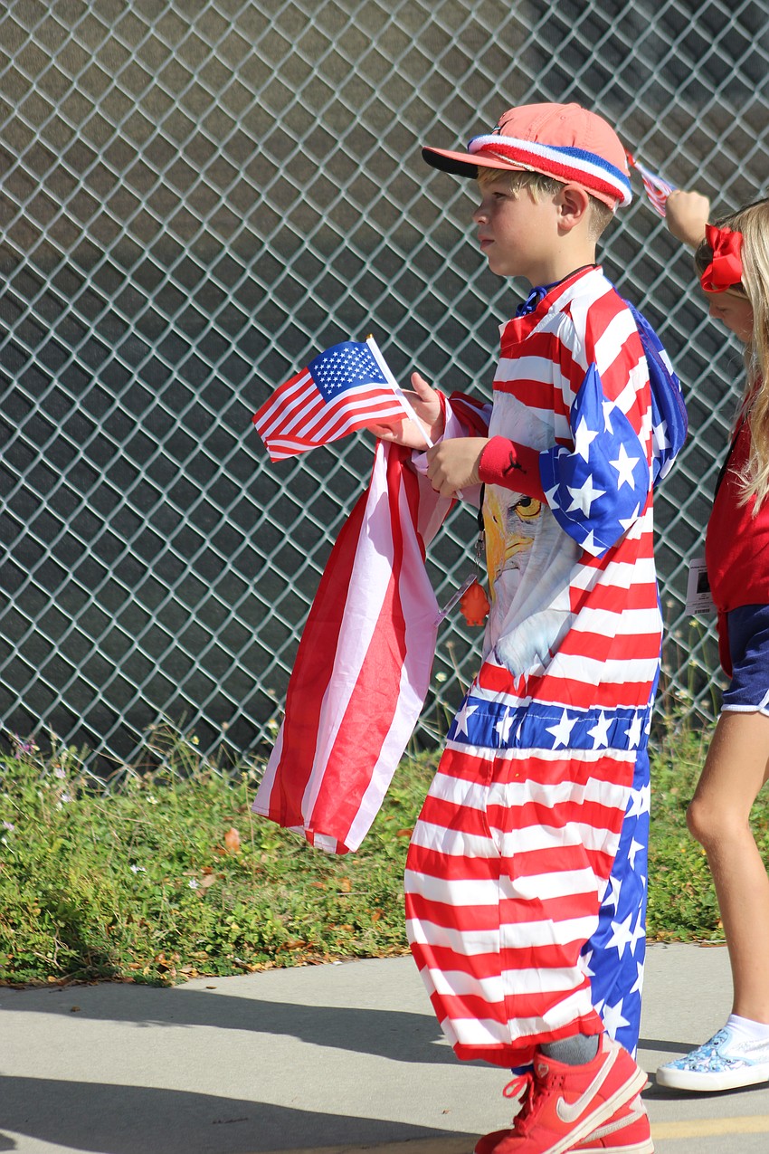 McNeal student Parker Neitzel showed his patriotism during the Veterans Day parade at the school.