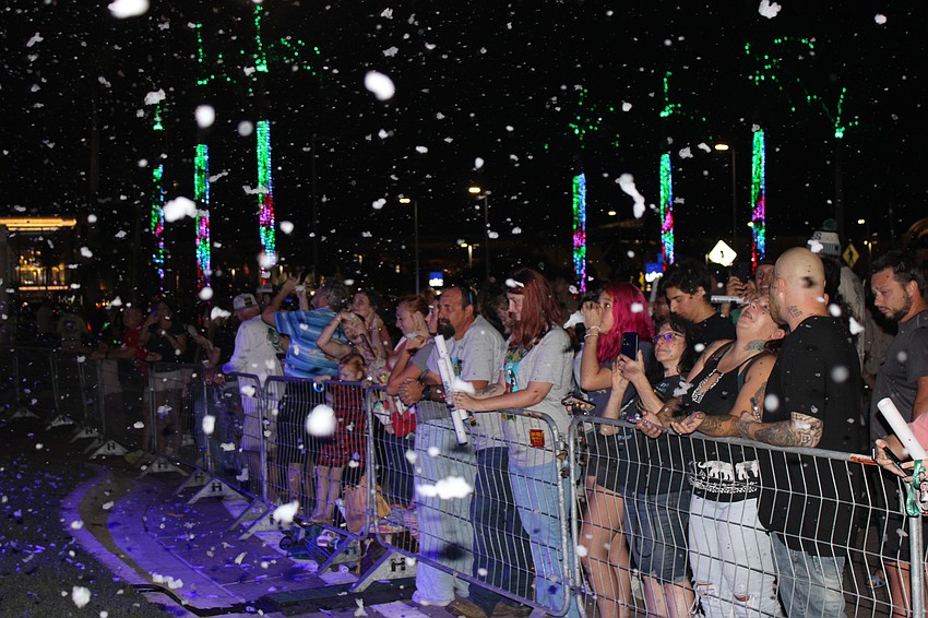 Yes, it was snowing (fake flakes) in Sarasota before the Cassadee Pope concert following the Santa's Grand Arrival Parade.