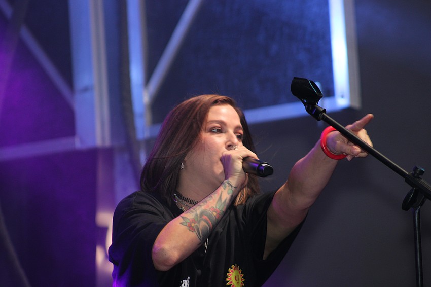 Pop and country singer Cassadee Pope kept the night rocking after the Santa's Grand Arrival Parade.