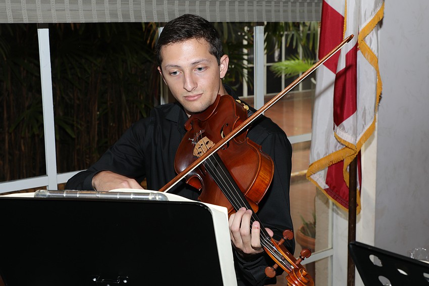 Music major Jacob Rodriguez performs at the event.