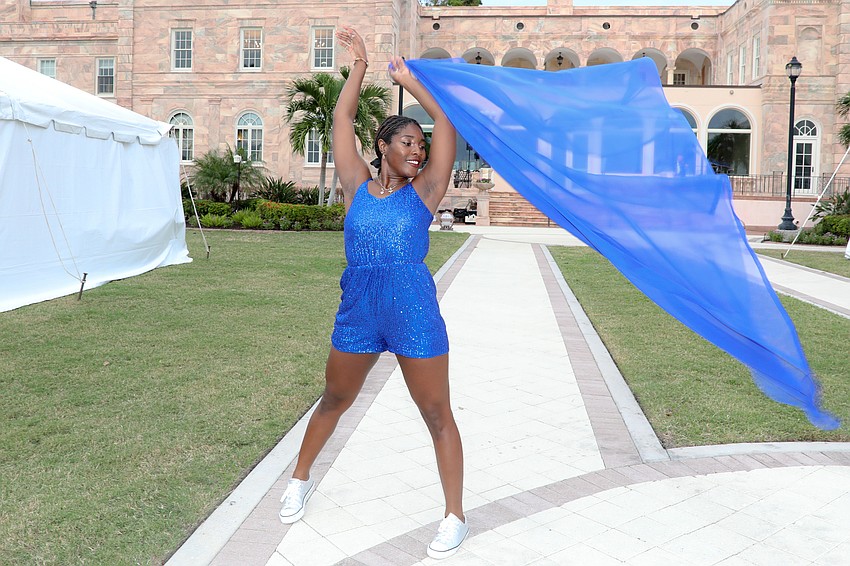 Contemporary dancer Sarah Affainie performs during cocktail hour.