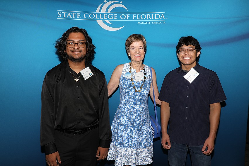 Carol Beeler mentors SCF students Sameer Hamid and Yonathan Ruiz-Nunez.