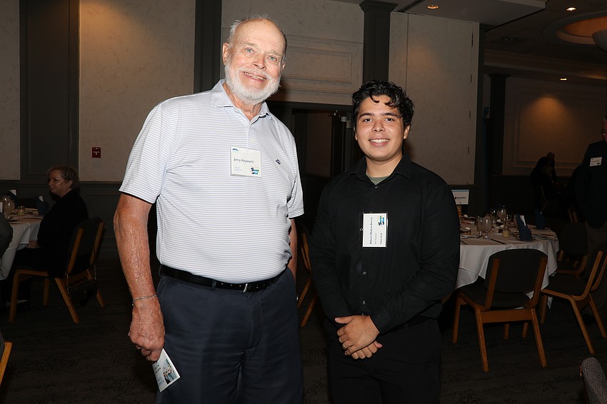 Retired engineer Jerry Hayward mentors freshman engineering student Albert Molina-Sierra.