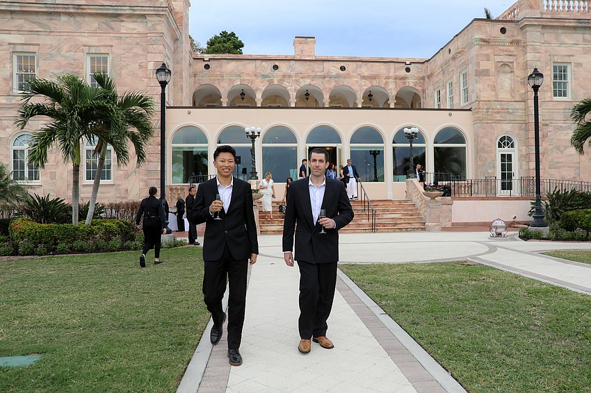 River Yang and Paul Celaya are ready for a champagne toast.