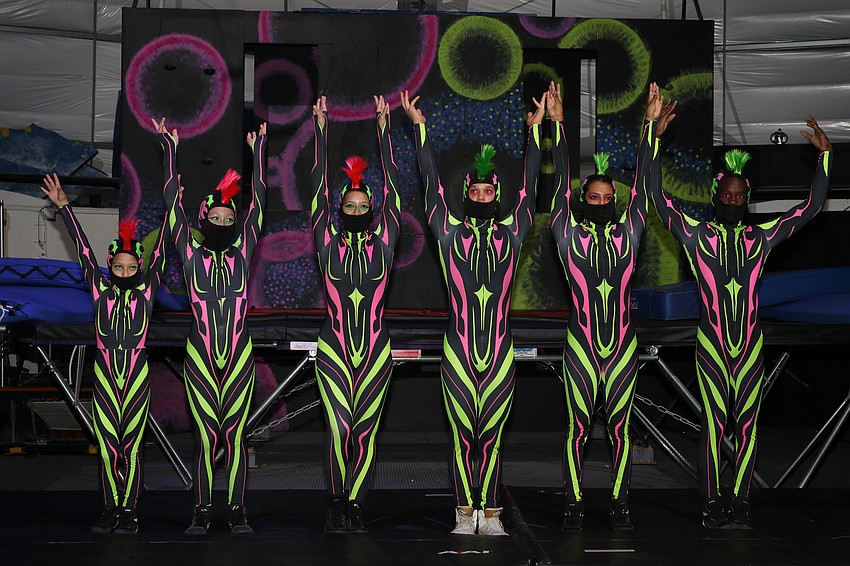 Sailor Circus performers delight the crowd in a glow in the dark performance.