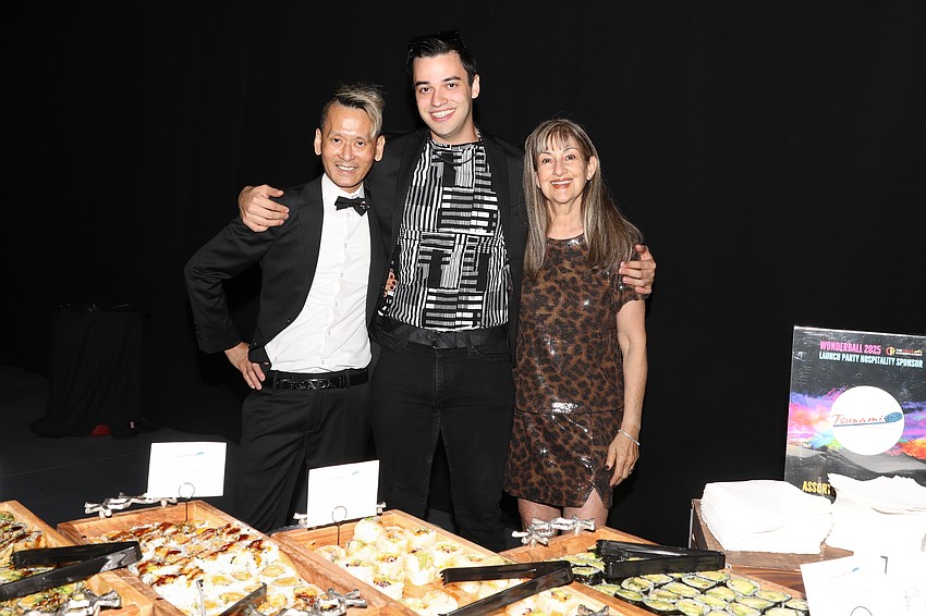 Jeffrey Karasawa, Jason Klamson and mom, Elizabeth, delighted guests with a true Tsunami experience.