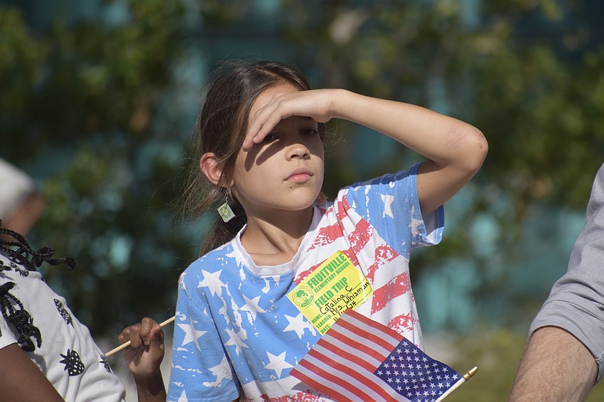 Catalina C. of Fruitville Elementary School watches as the parade begins.