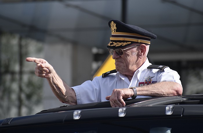 Col. Ben Knisely, who served 28 years in the U.S. Army and was honored as Veteran of the Year, interacts with the public during the 2024 Veterans Day parade.