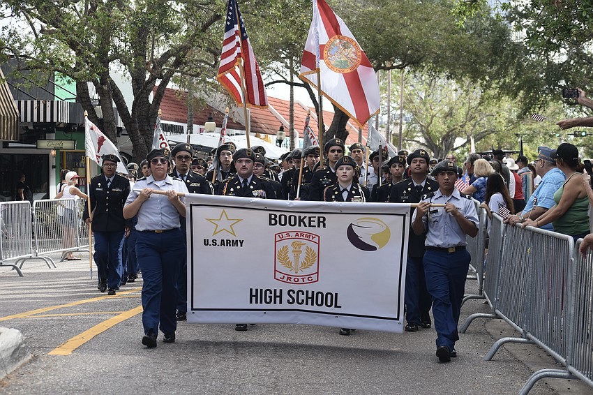 Booker High School's JROTC team walks the parade route.