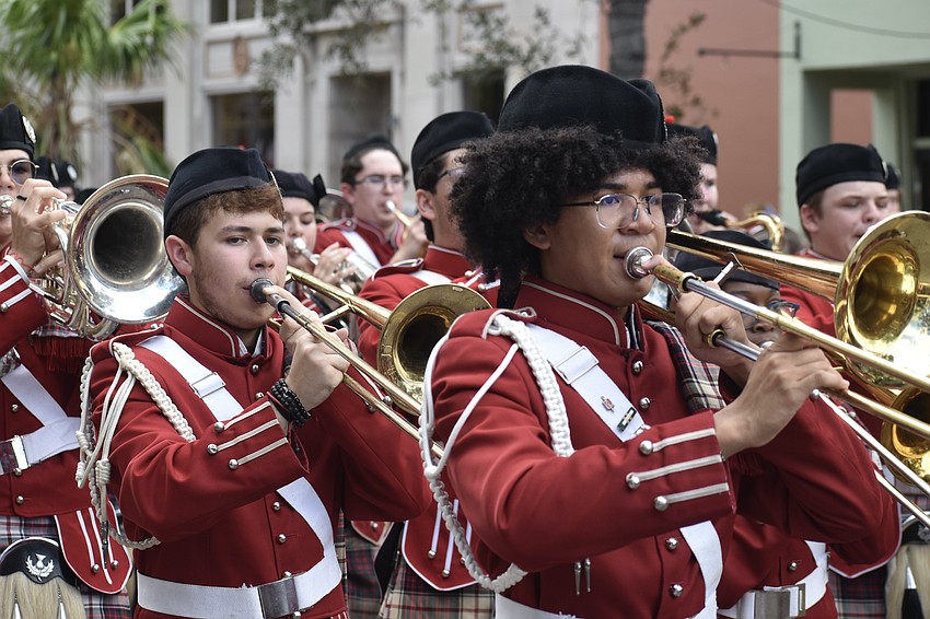 The Riverview High School Kiltie Band marches in the parade.