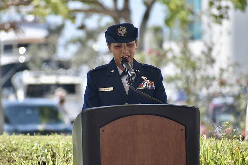Erica Stone Gregory, who served 20 years in the U.S. Air Force, delivers a speech at the ceremony.