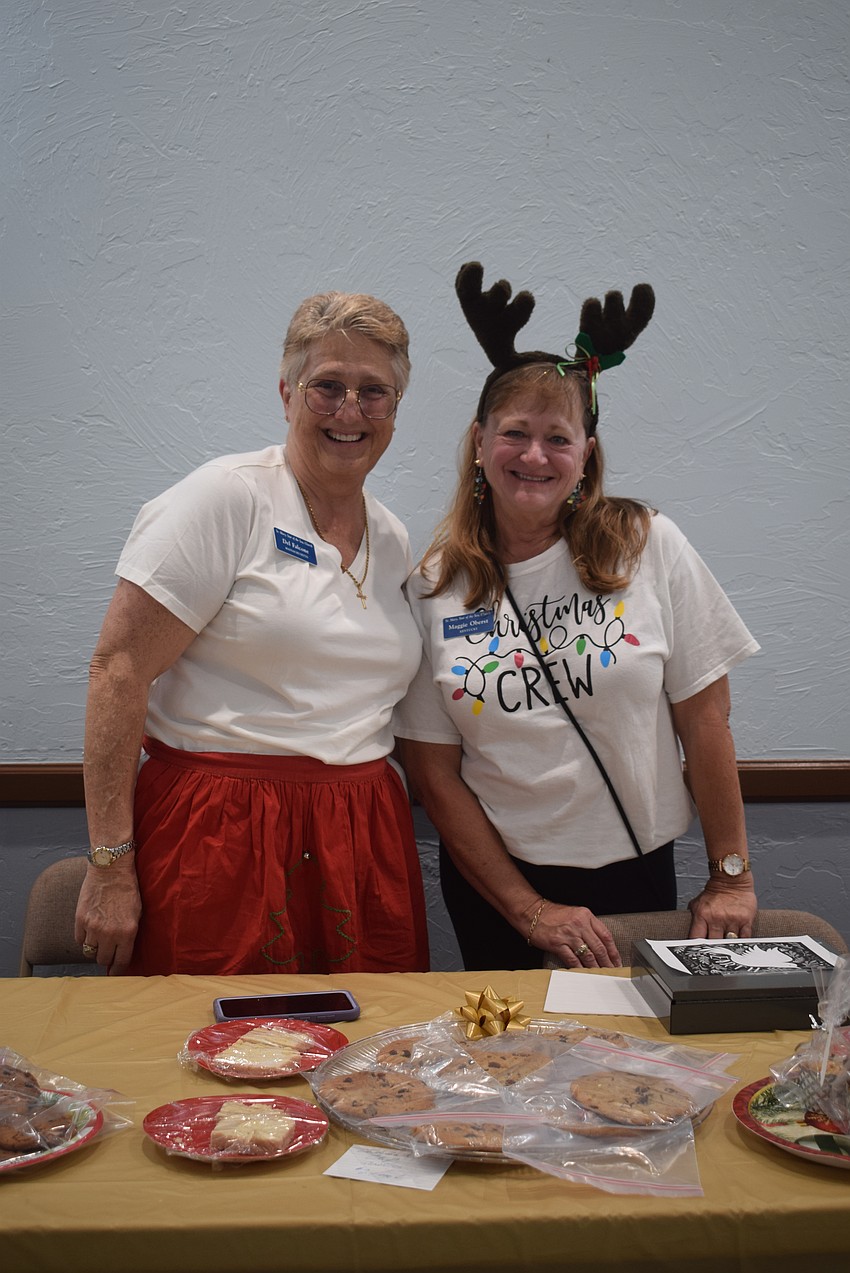 Del Falcone and Maggie Oberst at the St. Mary Christmas Bazaar.