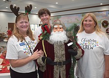 Maggie Oberst, Catherine Costello and Bonnie Schneider at the St. Mary Christmas Bazaar.