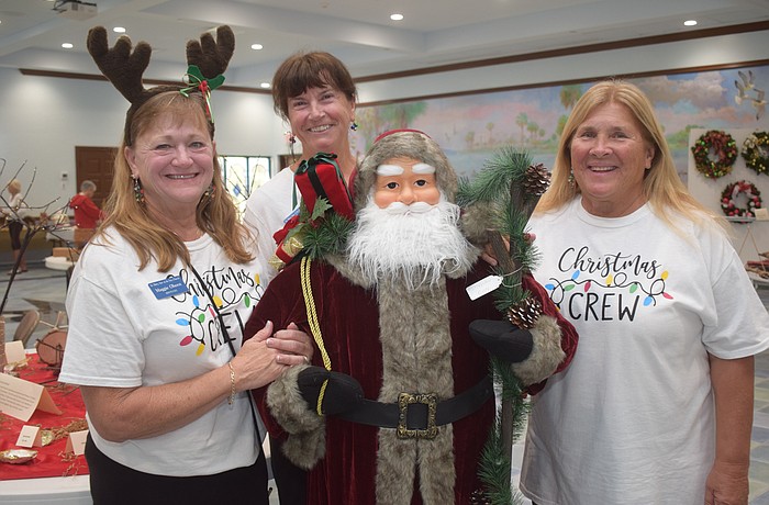 Maggie Oberst, Catherine Costello and Bonnie Schneider at the St. Mary Christmas Bazaar.