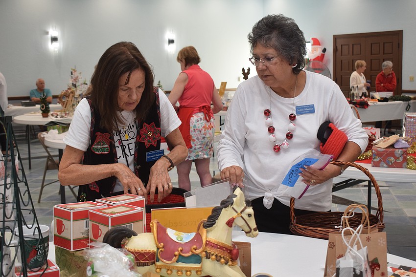 Rosemary Calandruccio and JoAnn Sifuentes at the St. Mary Christmas Bazaar.