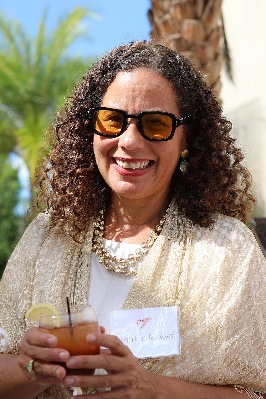 Jennifer Bowser accepts a Bloody Mary prepared by Michael's on East.