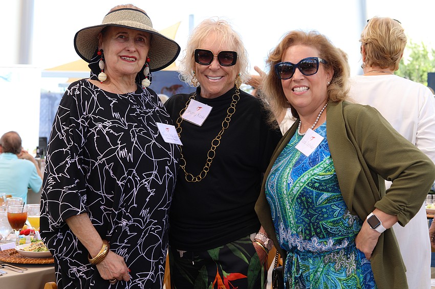 Honorary Trustee Flora Major, Sherry Koski and Lisa Zelniker catch up on the latest Sarasota happenings.