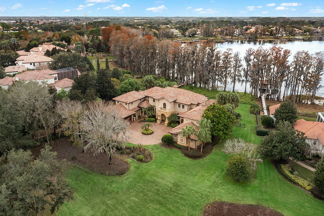 The home at 6120 Kirkstone Lane, Windermere, sold Nov. 5, for $3,800,000. This Mediterranean-style estate spans 6,972 square feet on 1.28 acres on the shores of Lake Butler.  The sellers were represented by Monica Lochmandy, Isleworth Realty LLC.