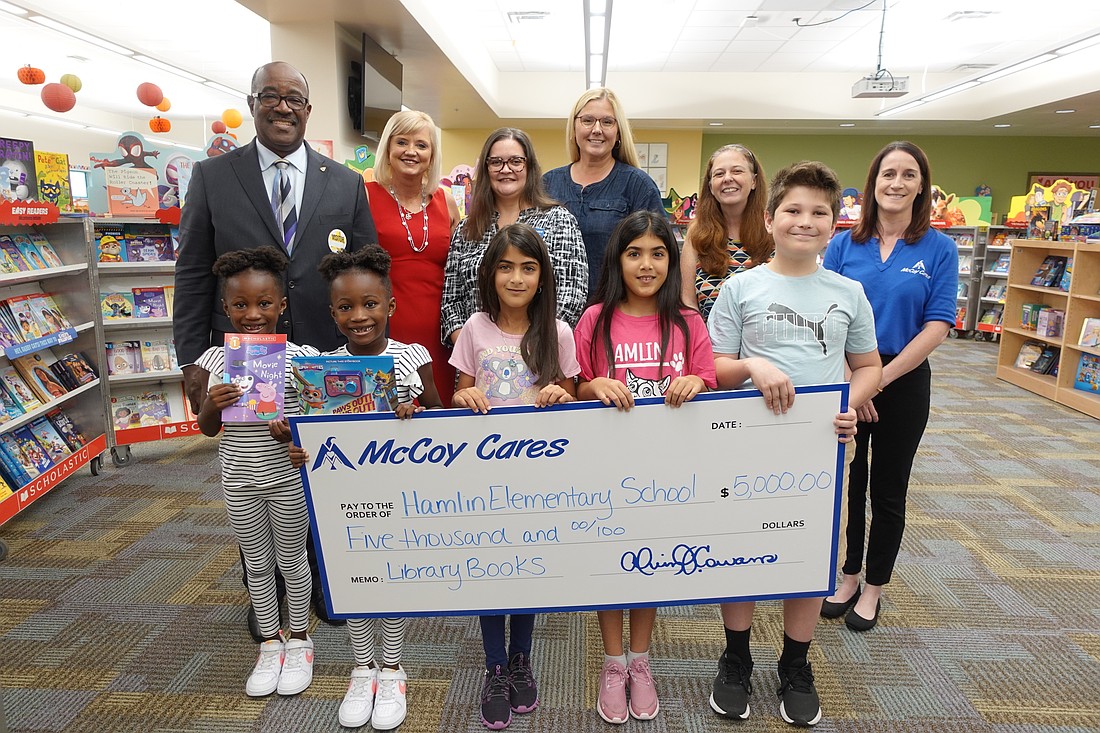 McCoy Federal Credit Union traveled to Hamlin Elementary School in Horizon West to present the $5,000 check.