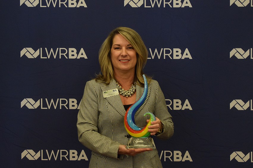 After being a member of the Lakewood Ranch Business Alliance for 18 years and being a member of the committee that created the Sandies, Cherri Kessler of Hancock Whitney Bank has won her own award, Networking Queen.