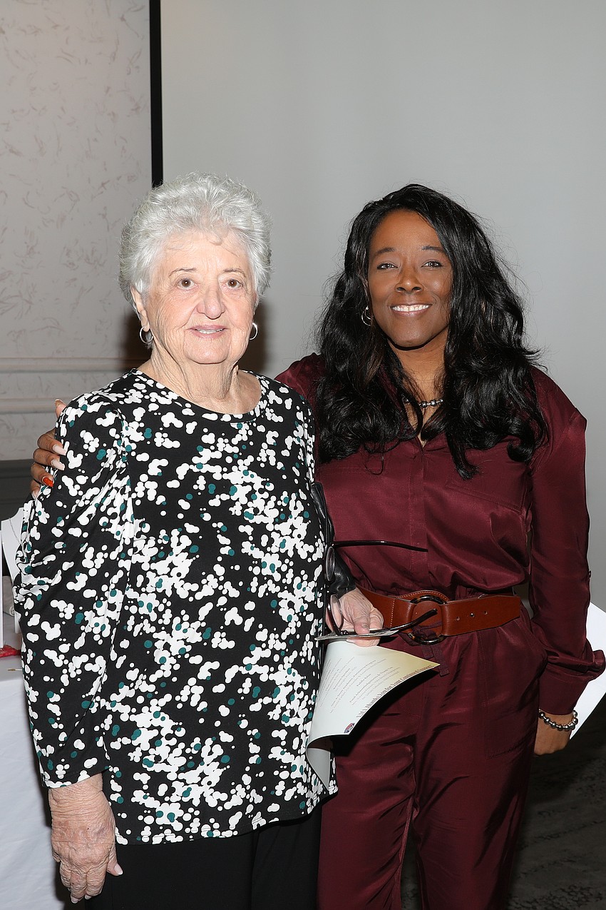 Visible Men Academy donor JoAnn Johns and Lori D. Benton.