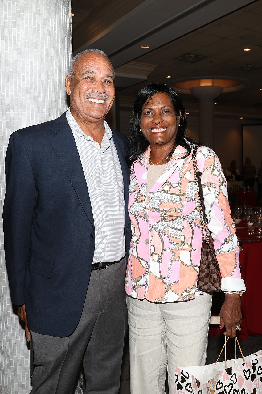 Visible Men Academy co-founder Louis Parker with with his wife, Kayon.